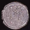 Follis of Justin II struck at Nicomedia.